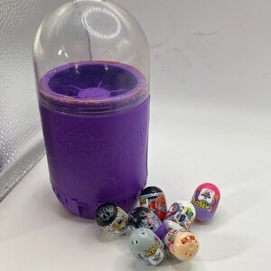 Mighty Beanz collection of 7 beans with purple storage canister